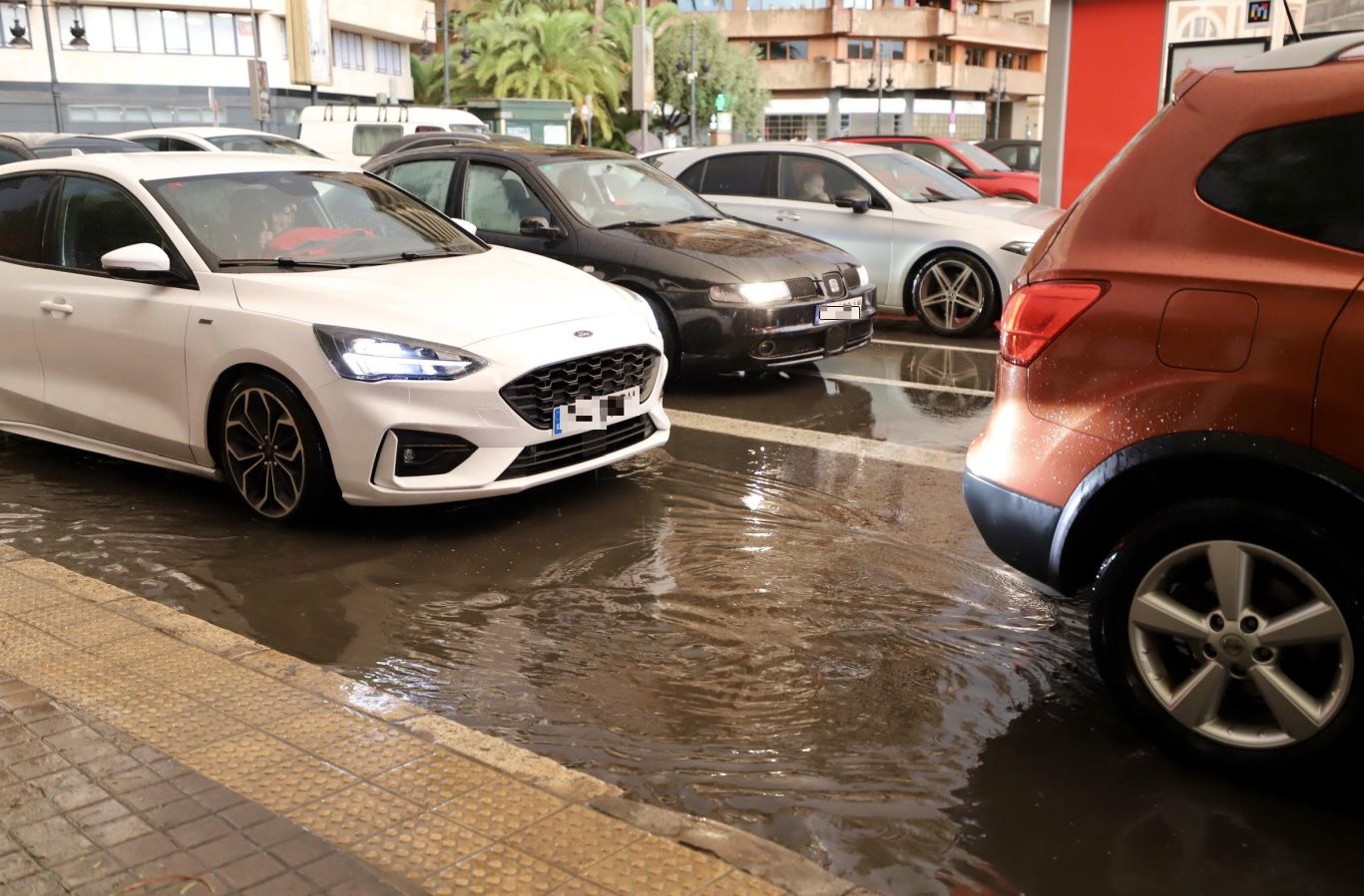 La jornada de lluvia en Valencia, en imágenes