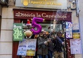 Celebración en una administracion de Loterías.