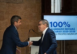 Mazón y Rovira, durante la presentación del balance.