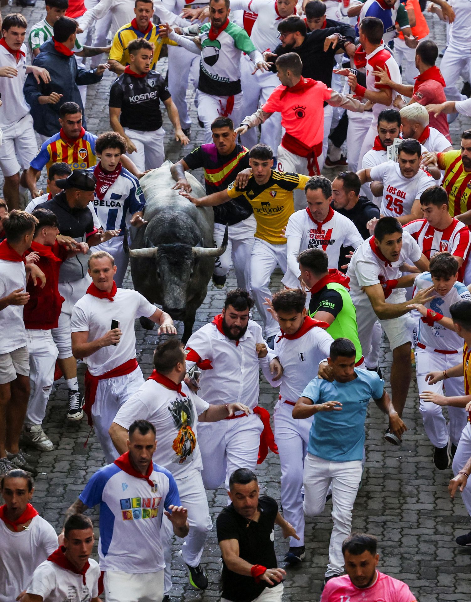 El sexto encierro de San Fermín 2025, en imágenes