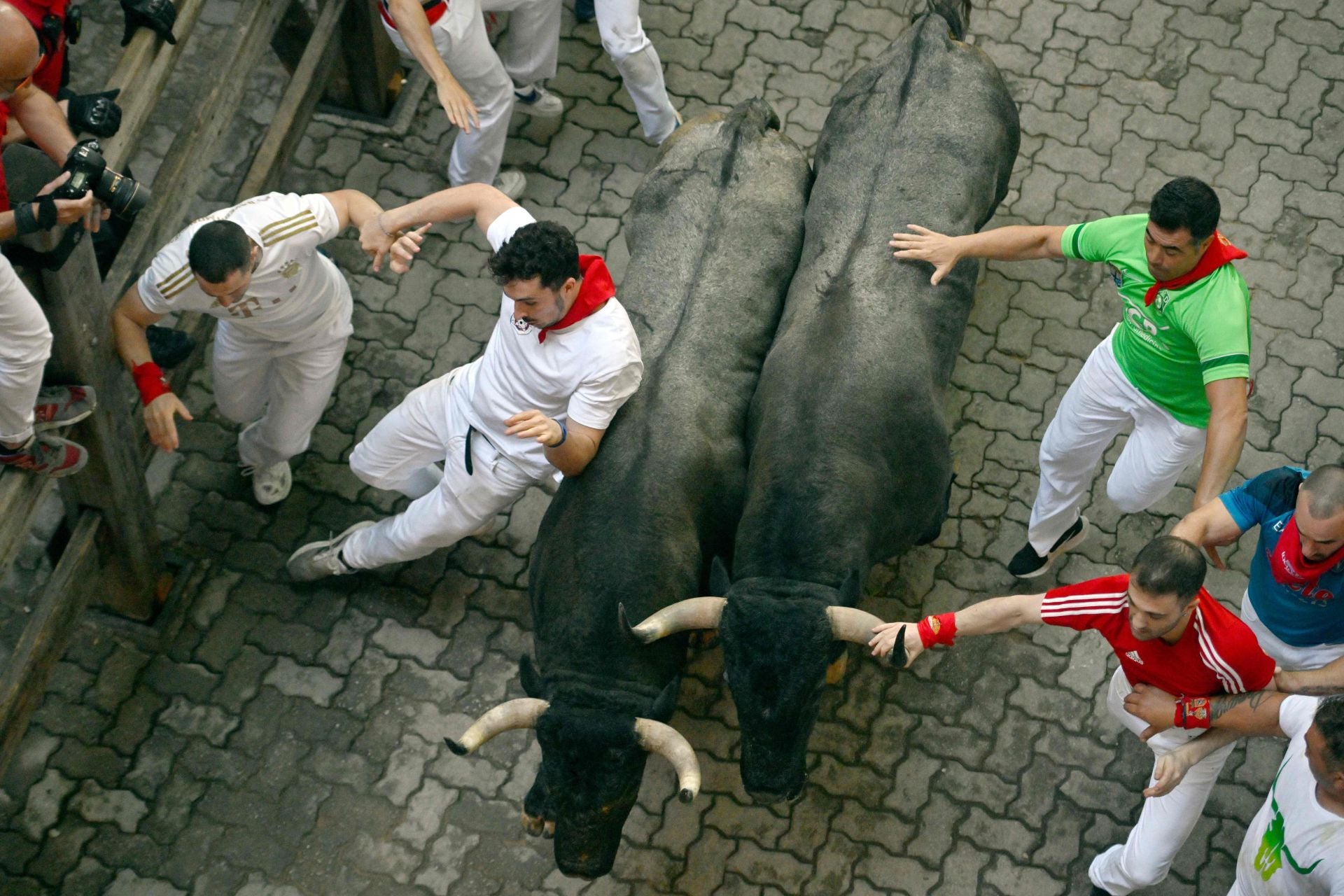 El sexto encierro de San Fermín 2025, en imágenes