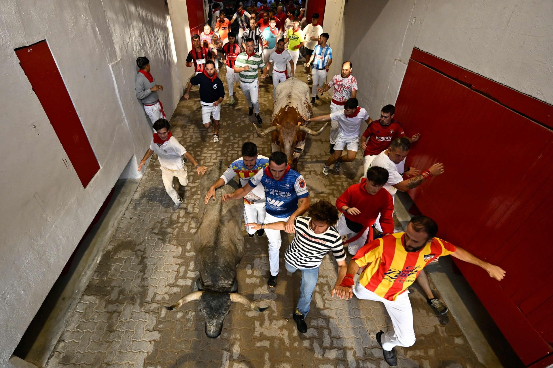 El sexto encierro de San Fermín 2025, en imágenes