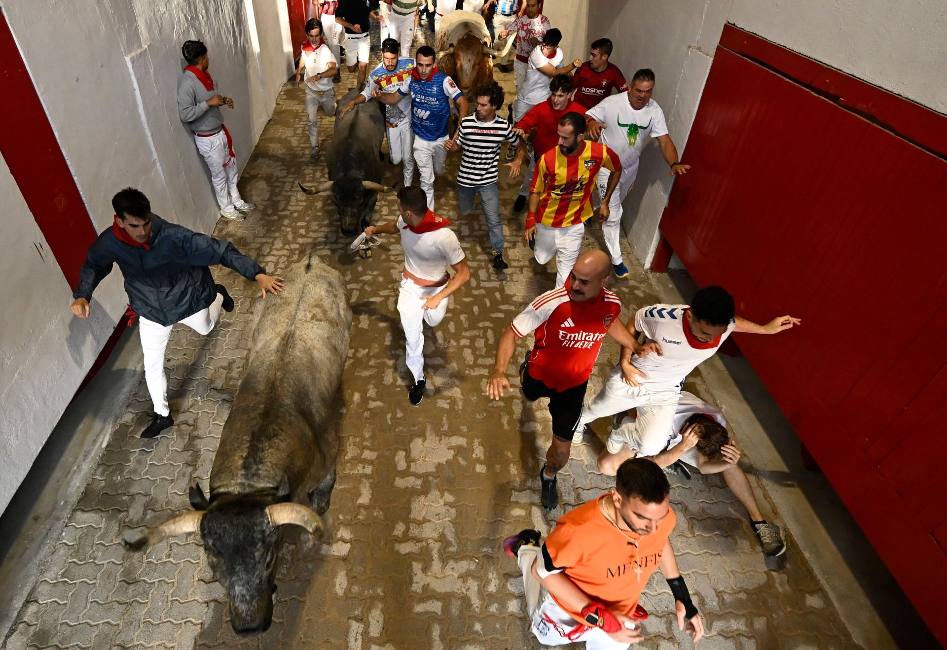 El sexto encierro de San Fermín 2025, en imágenes