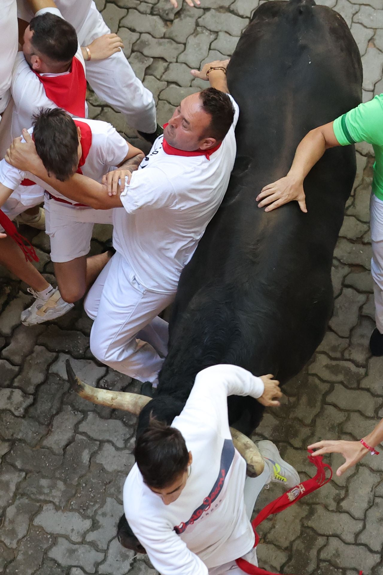 FOTOS | Séptimo encierro de San Fermín 2025