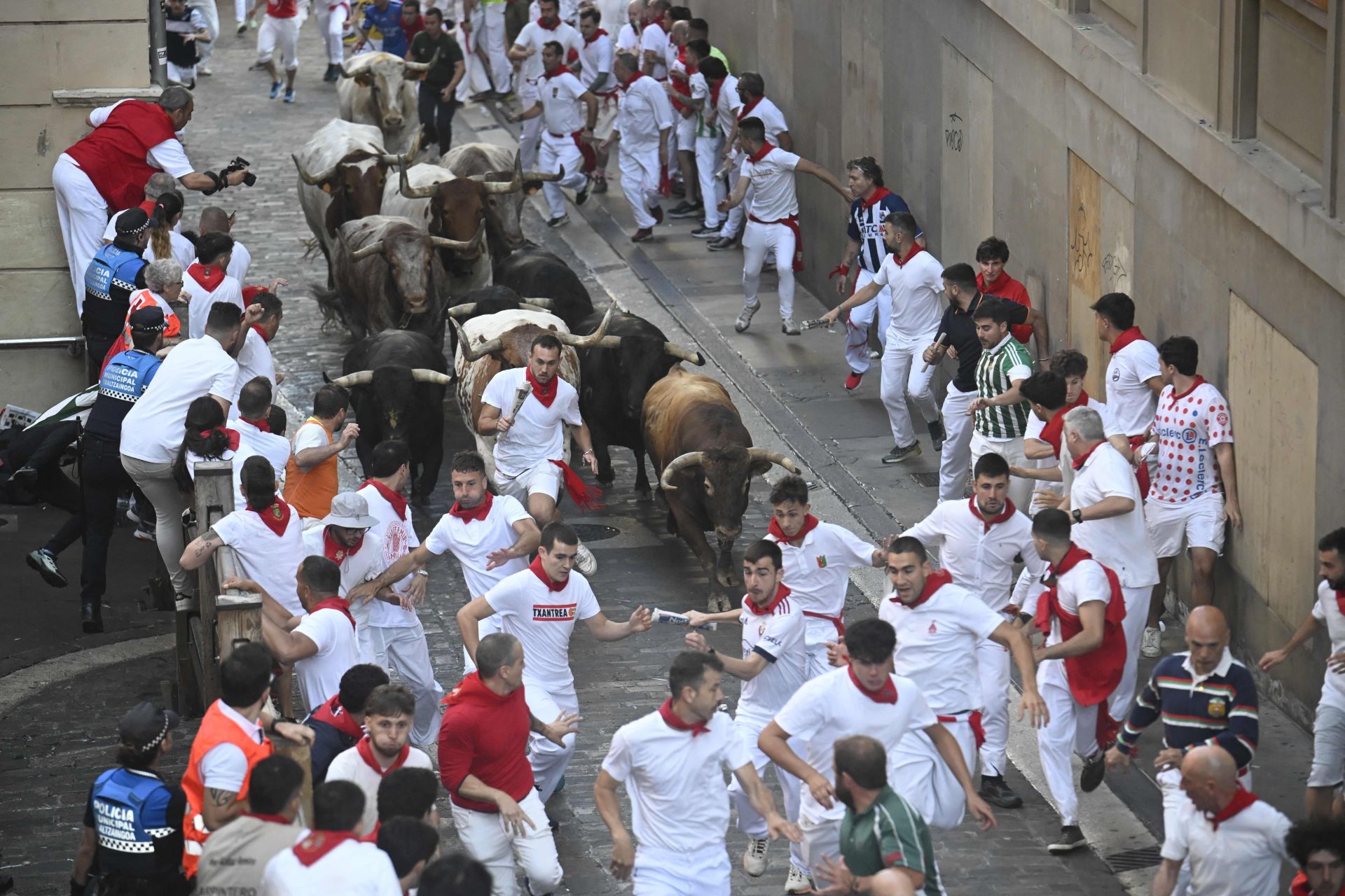 FOTOS | Séptimo encierro de San Fermín 2025