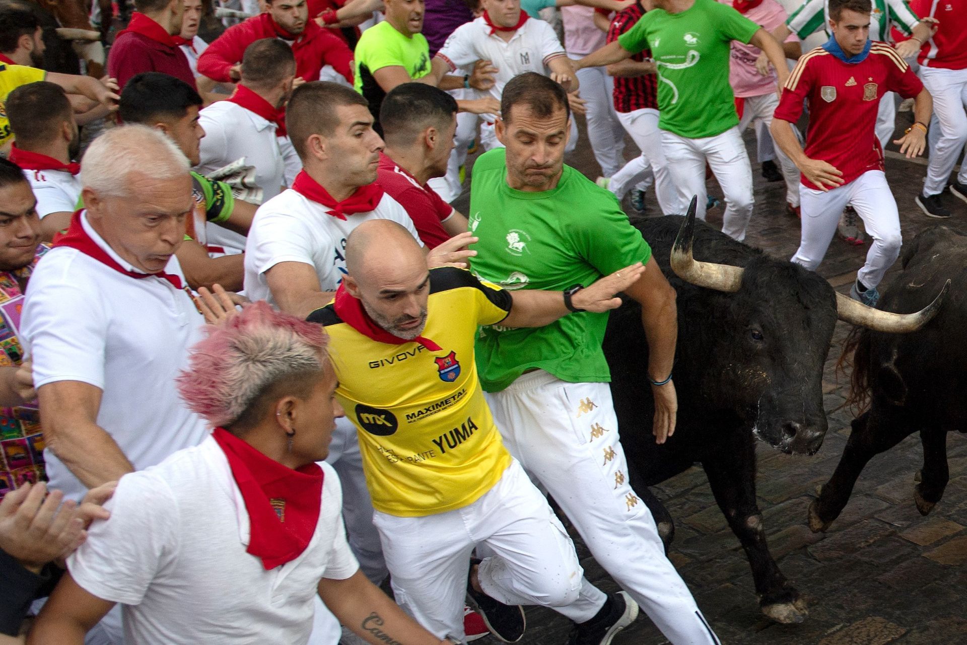 FOTOS | Séptimo encierro de San Fermín 2025