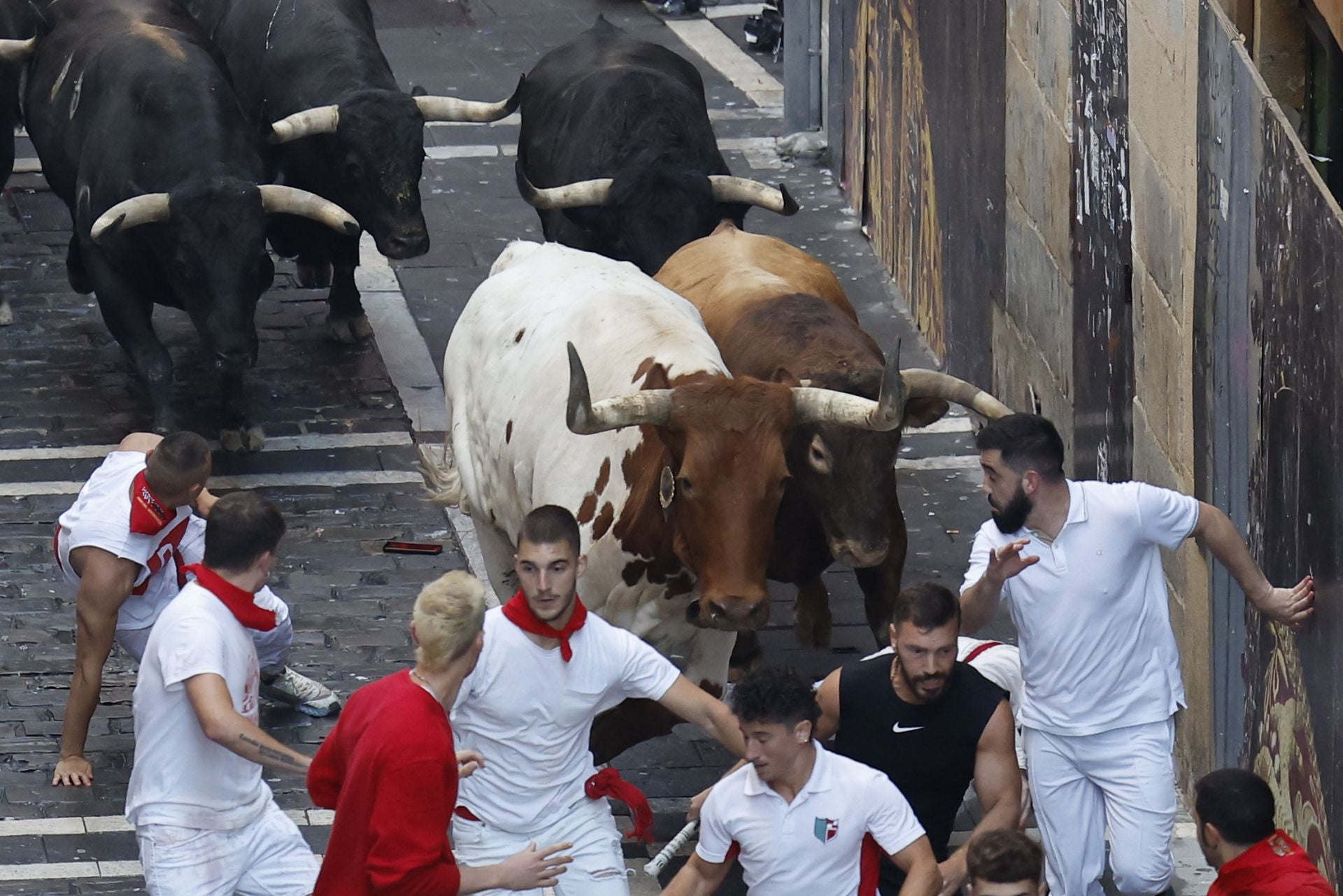 FOTOS | Séptimo encierro de San Fermín 2025