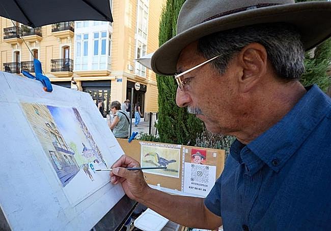 Leopoldo pintando en la Plaza de la Reina