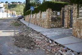 Estado tras la dana de una de las calles en Sierra Perenchiza.