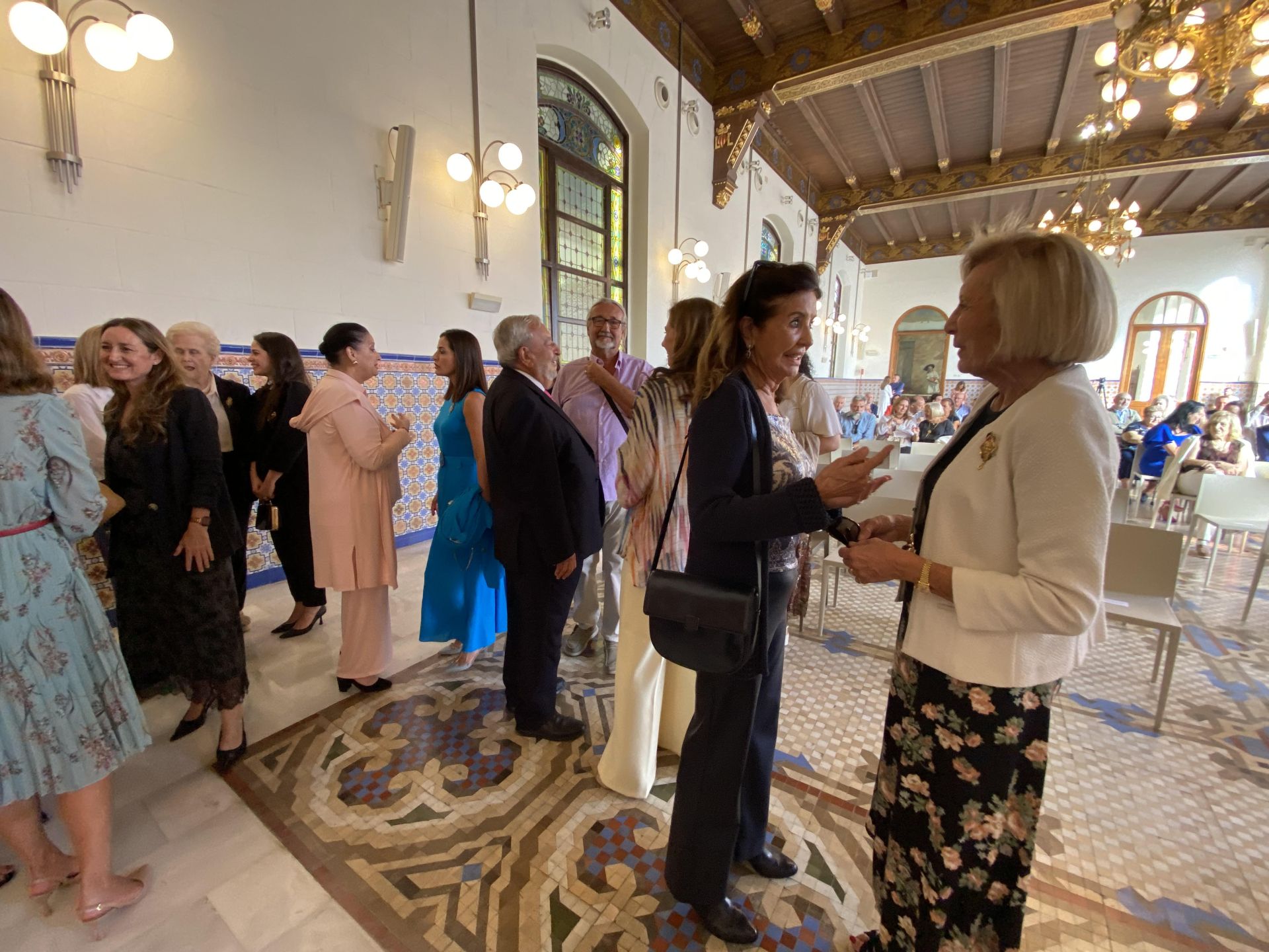 FOTOS | Las falleras mayores de Valencia se reúnen en el Palacio de la Exposición
