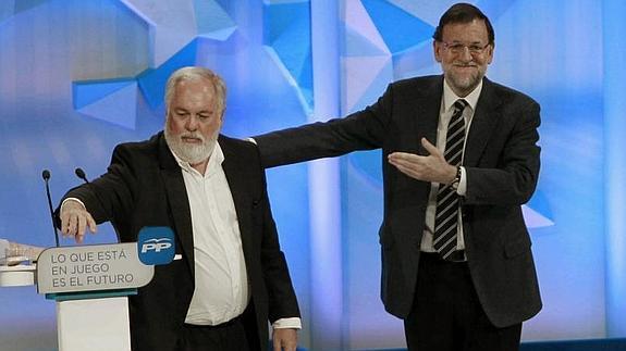 Cañete y Rajoy. 