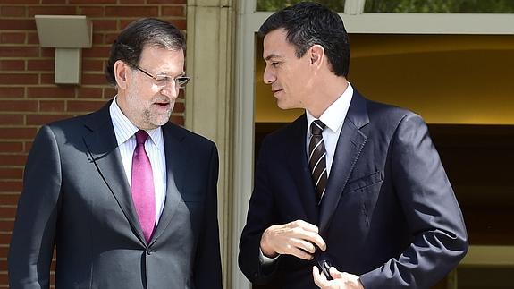 Rajoy y Sánchez, antes de la reunión.