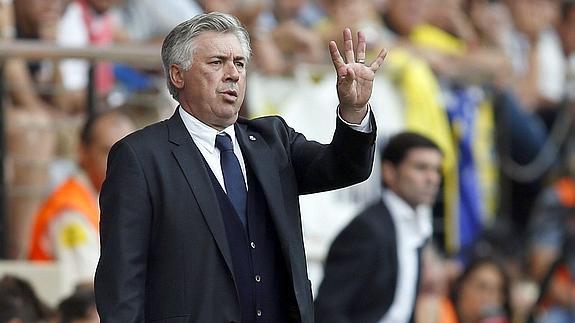 Ancelotti (i) y Marcelino. 