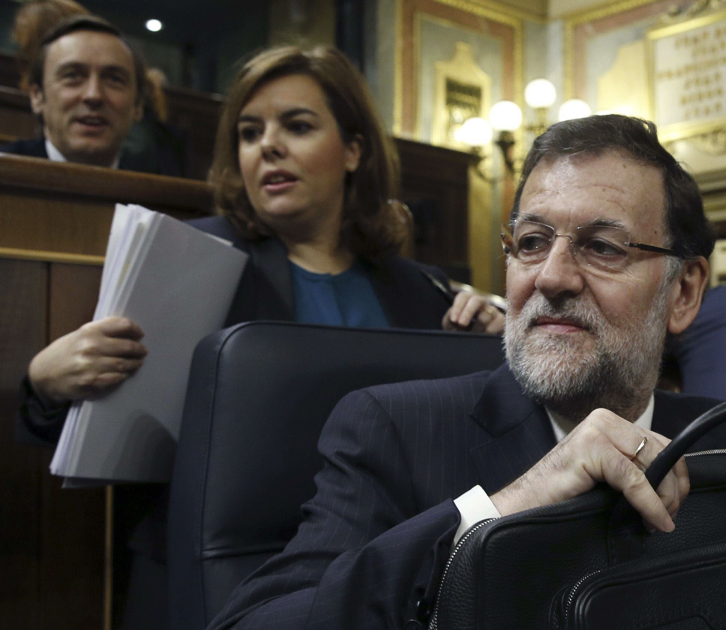 Rafael Hernando, Soraya Sáenz de Santamaría y Mariano Rajoy. 