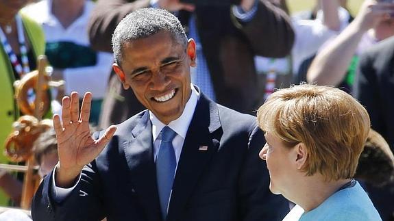 Obama, junto a Merkel. 