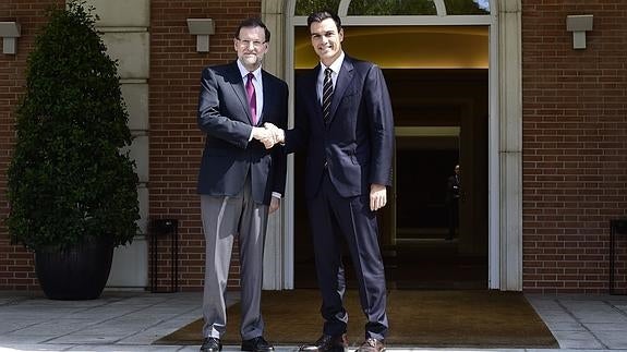 Mariano Rajoy y Pedro Sánchez, en julio de 2014.