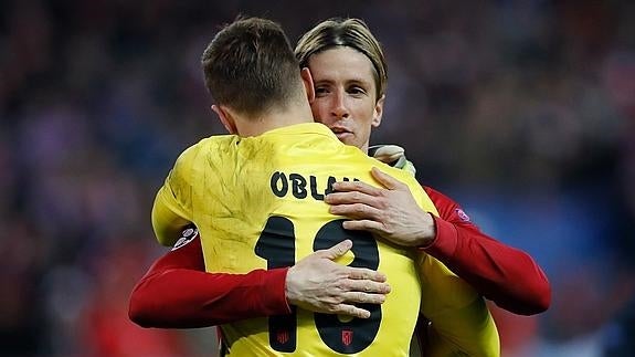 Fernando Torres y el guardameta esloveno Jan Oblak. 