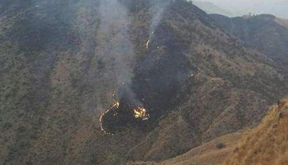 Fuego y humo en la zona del siniestro.