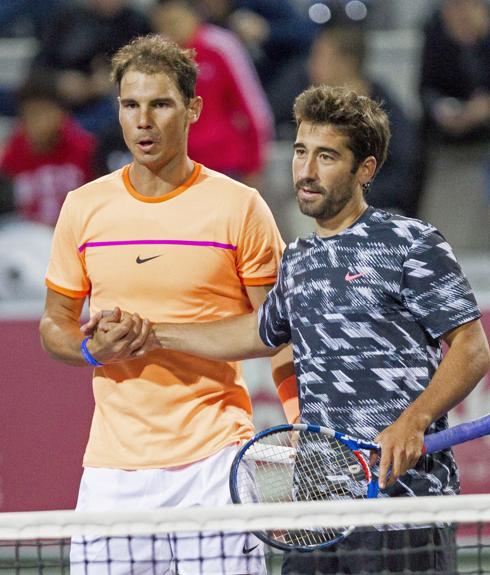 Rafa Nadal y Marc López celebran su victoria. 