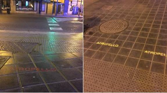 Los rótulos, en el suelo de Barón de Cárcer. 