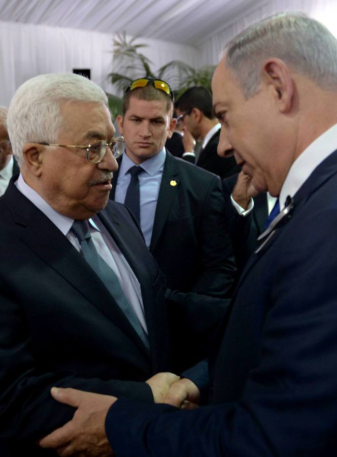 El presidente de la Autoridad Palestina, Mahmud Abás, y el primer ministro israelí, Benjamín Nentayahu.