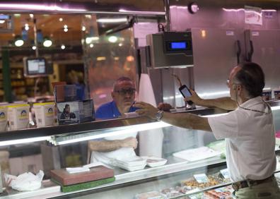 Imagen secundaria 1 - Amazon prime Now en el Mercado de la Paz de Madrid.