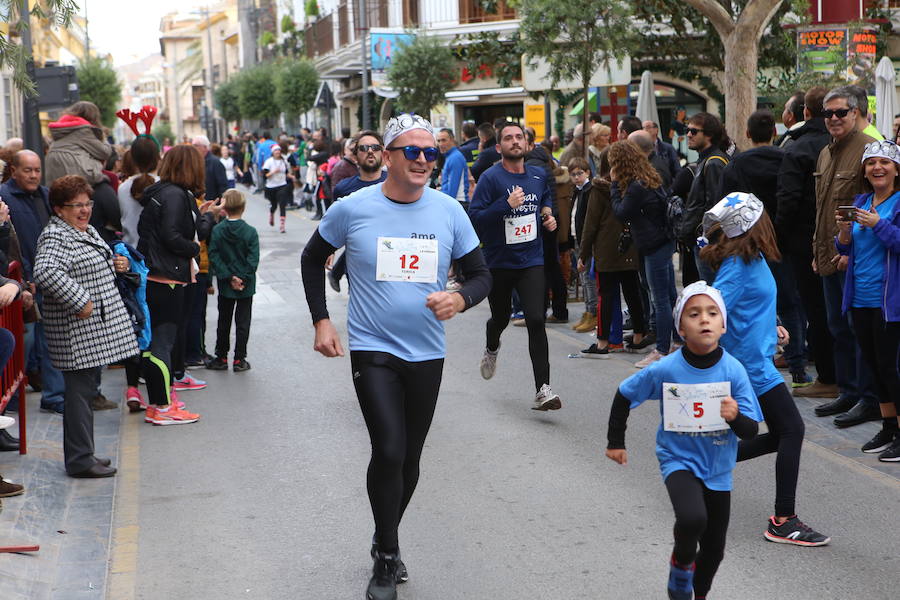 Miles de corredores han despedido el año corriendo por las calles de Lorca