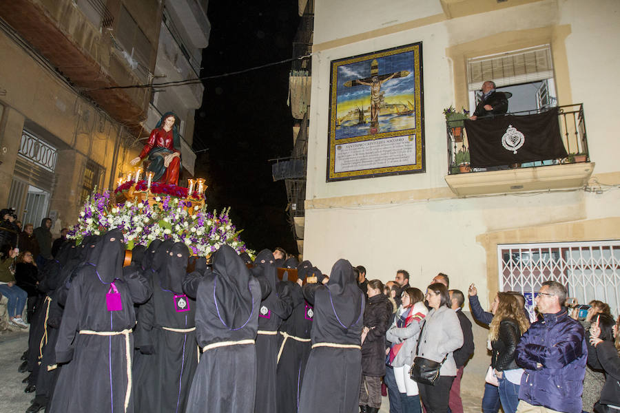 La primera procesión de España ha realizado estación penitencial en la iglesia de Santa María de Gracia, ante la imagen de la Virgen del Rosell, y en la basílica de la Caridad, ante la imagen de la actual Patrona 