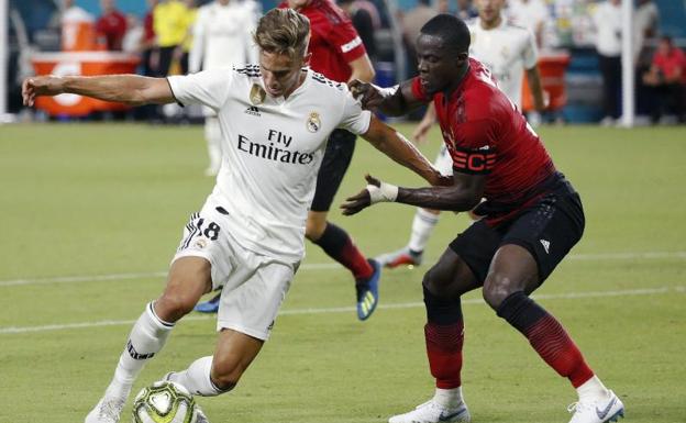 Marcos Llorente, ante Eric Bailly. 