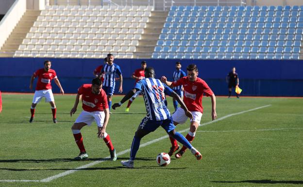 Jugadores del Lorca FC y de La Unión.