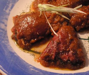 PIQUILLOS RELLENOS  DE BOLOGNESA