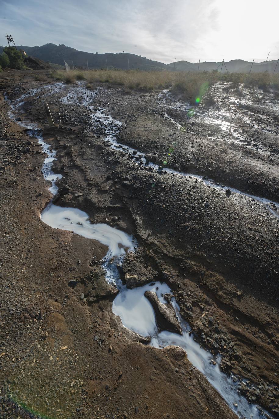 Fotos: Vecinos del Llano denuncian otro arrastre de residuos mineros desde el solar de la antigua Balsa Jenny