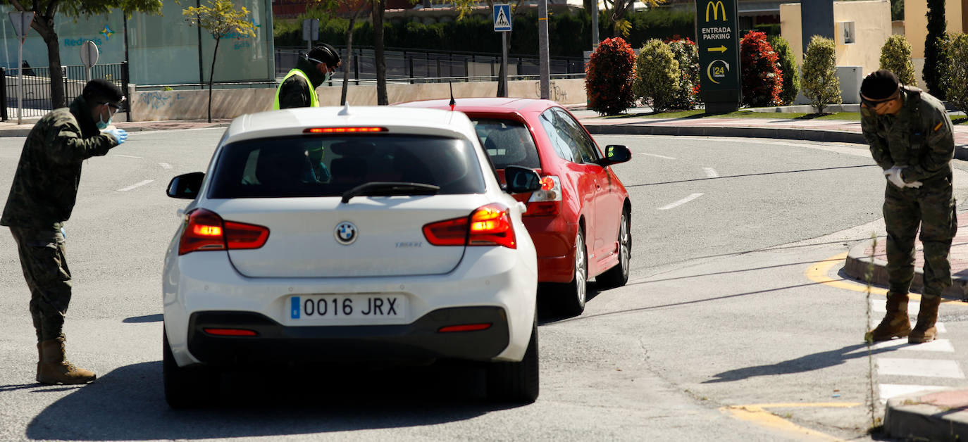 Fotos: Cerco en las carreteras a las escapadas de fin de semana