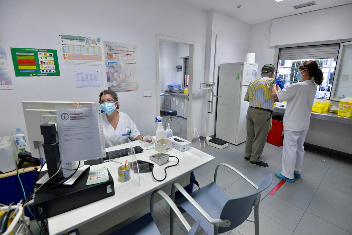 Fotos: Los centros de salud se quedan sin dosis de la vacuna de la gripe ante la alta demanda