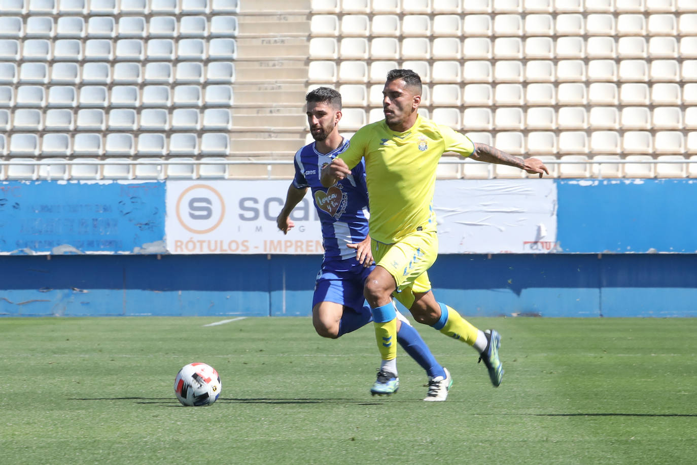 Fotos: Justo reparto de puntos para el Lorca en un partido de trámite