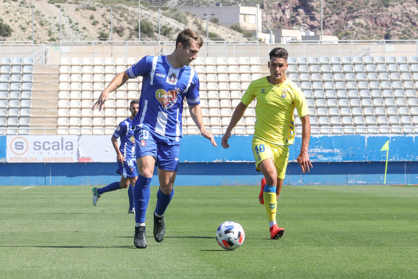 Fotos: Justo reparto de puntos para el Lorca en un partido de trámite