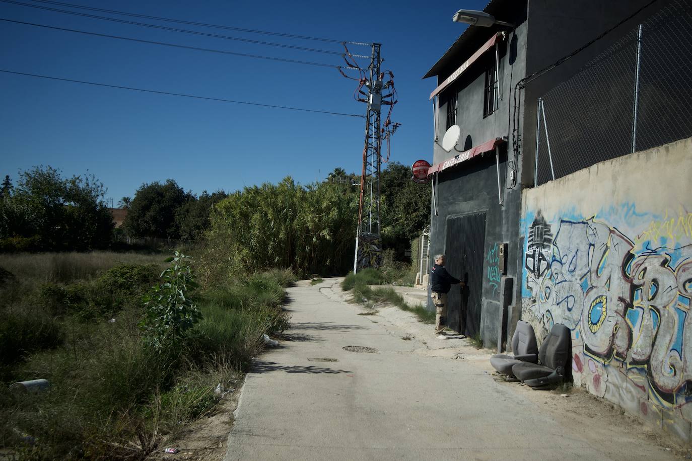 Fotos: Los últimos vecinos de la Orilla de la Vía se despiden de sus hogares