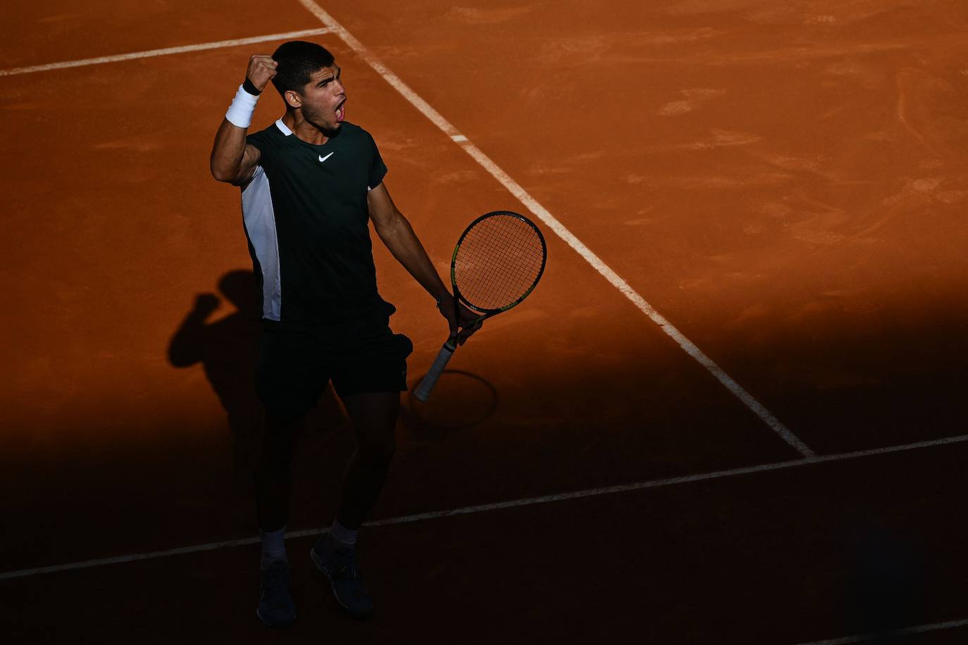 Fotos: La victoria de Carlos Alcaraz ante Novak Djokovic en el Masters de Madrid, en imágenes