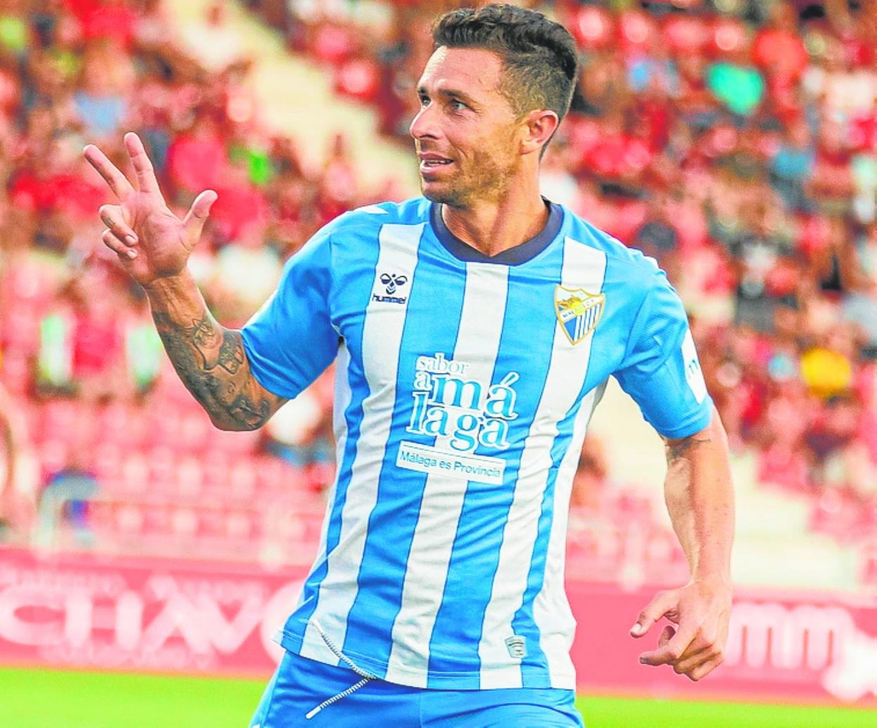 Rubén Castro celebrando un gol con el Málaga. 