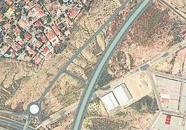 Recreación del paso de la nueva autovía junto al barrio.