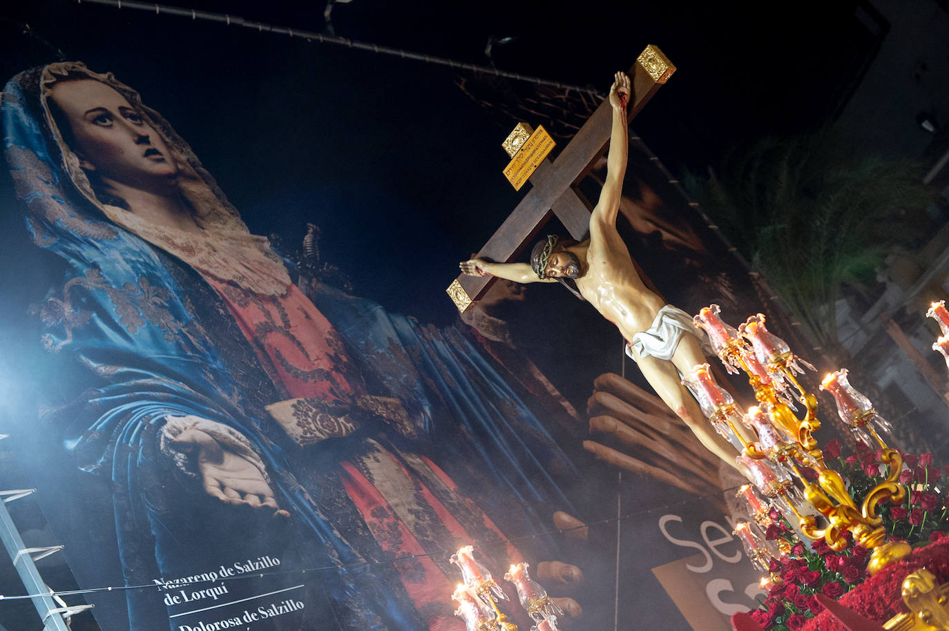 Procesión de la Cofradía del Santísimo Cristo de la Caridad en Murcia, en imágenes