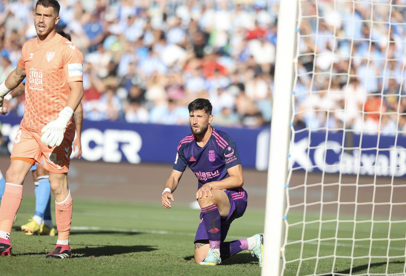 El partido del Cartagena contra el Málaga, en imágenes