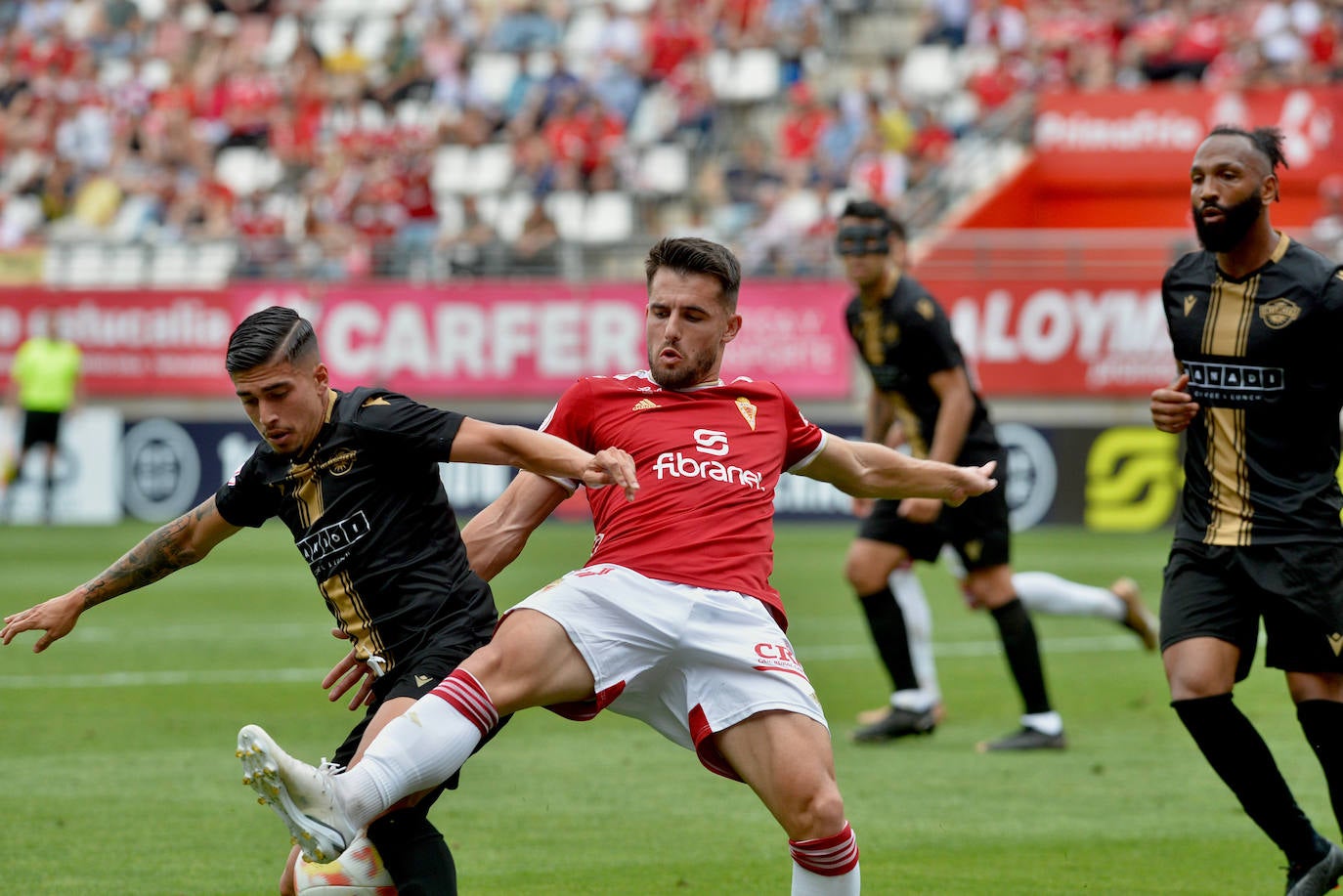 La derrota del Real Murcia frente al Intercity, en imágenes