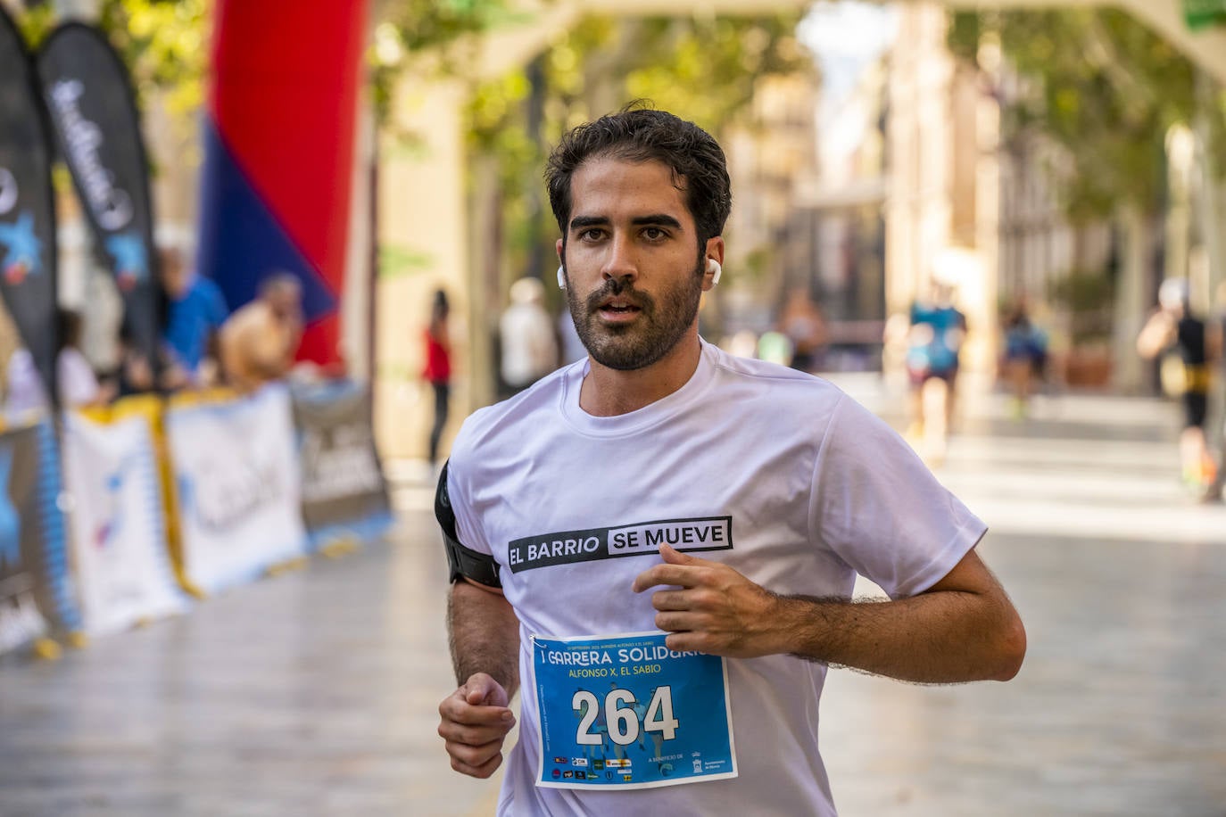 La I Carrera Solidaria Alfonso X de la Feria de Murcia, en imágenes