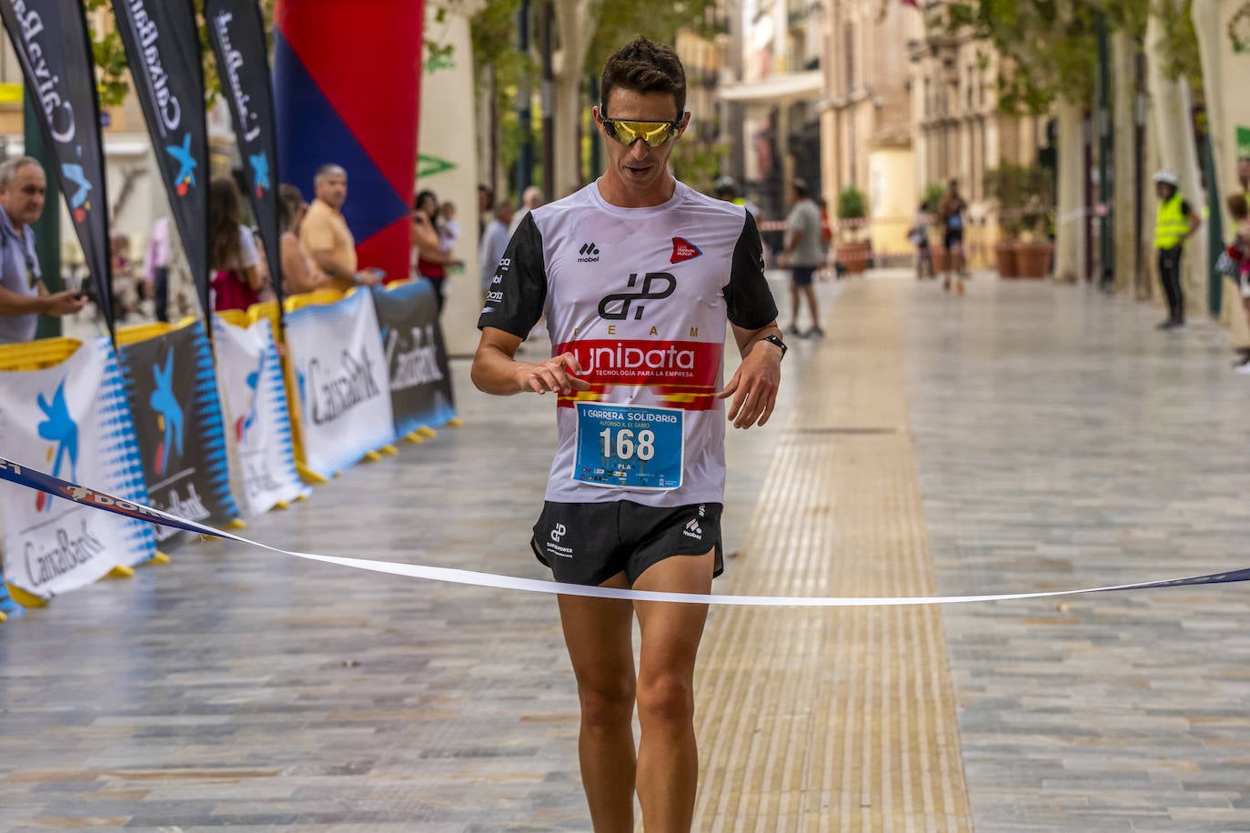 La I Carrera Solidaria Alfonso X de la Feria de Murcia, en imágenes