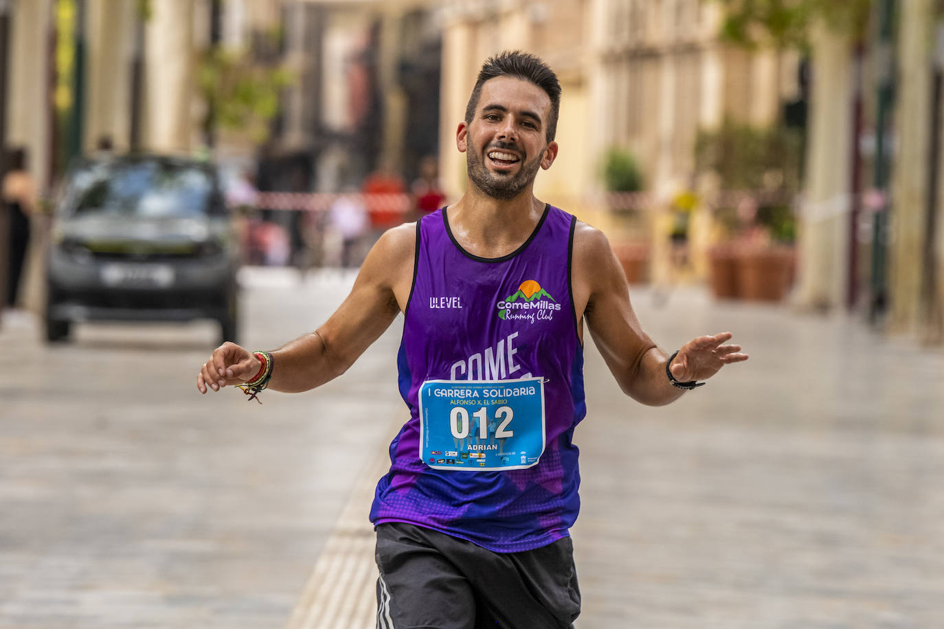 La I Carrera Solidaria Alfonso X de la Feria de Murcia, en imágenes