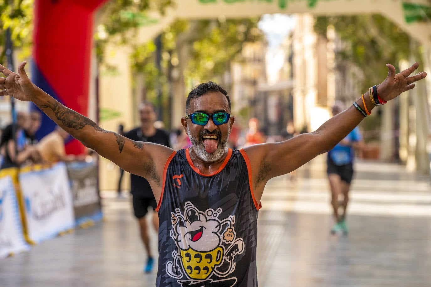 La I Carrera Solidaria Alfonso X de la Feria de Murcia, en imágenes