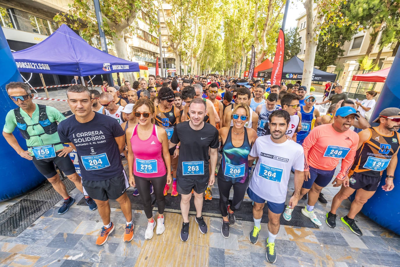 La I Carrera Solidaria Alfonso X de la Feria de Murcia, en imágenes