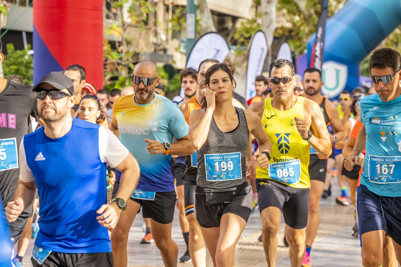 La I Carrera Solidaria Alfonso X de la Feria de Murcia, en imágenes