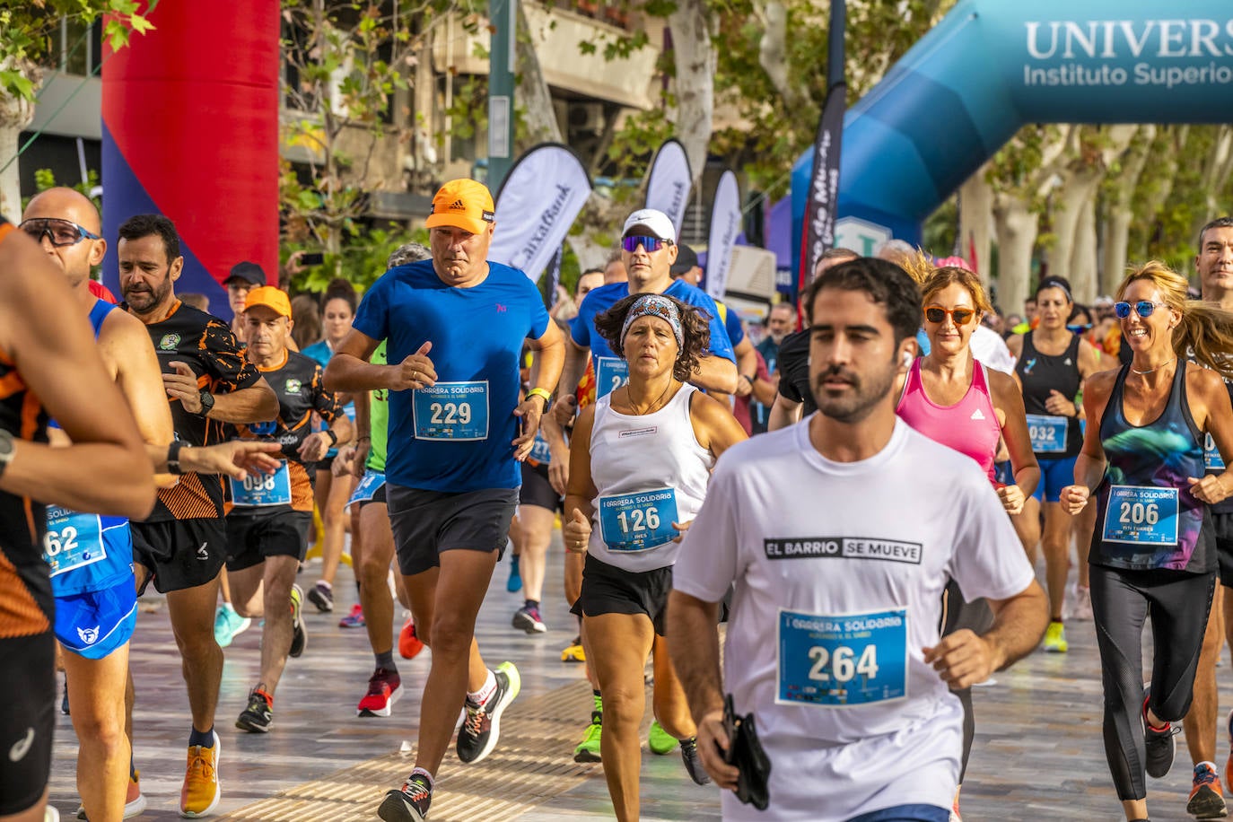 La I Carrera Solidaria Alfonso X de la Feria de Murcia, en imágenes